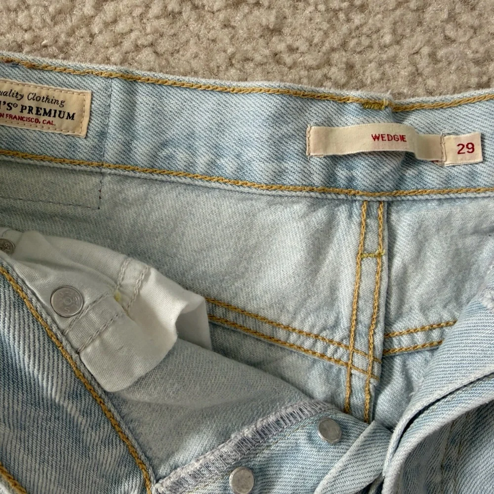 Levi’s Women’s Light Blue Distressed Denim Shorts